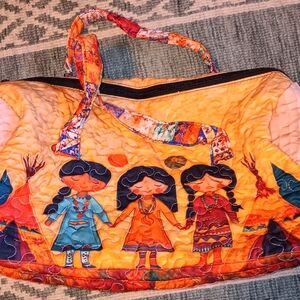 Quilted Orange Travel Tote with Colorful Doll Artwork